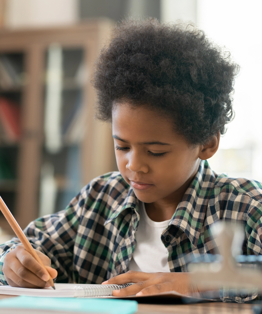 Third grade boy taking a writing test