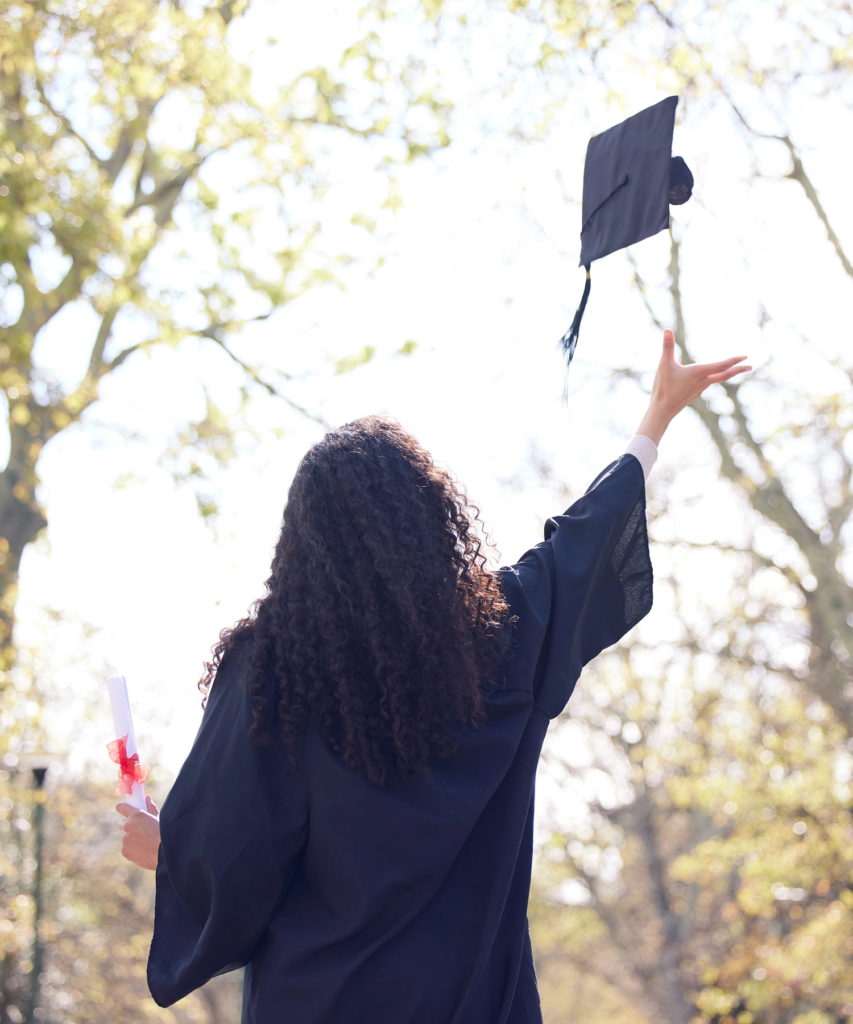Student throwing a graduation hat