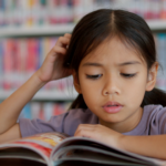 Girl Focused Reading A Book