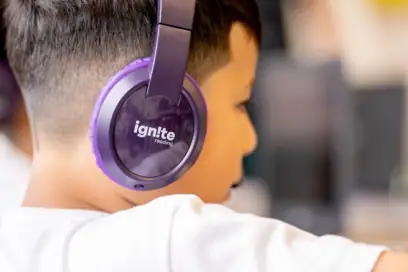 Ignite Reading Student wearing headphones