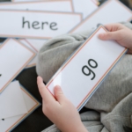 Child with High Frequency Word Flash Cards