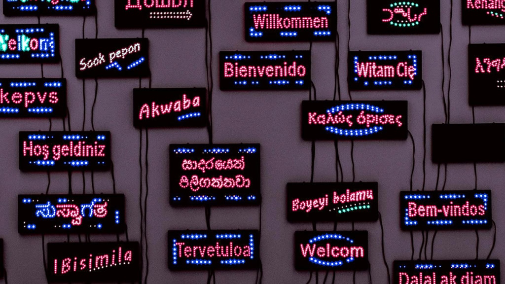 Multilingual sign board with welcome in many languages