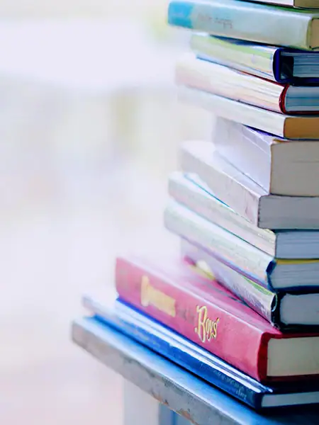 ROI of Reading Interventions — Proving Impact in Student Outcomes & District Budgets 6 Pile Of Books