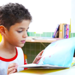 student reading book during reading interventions block