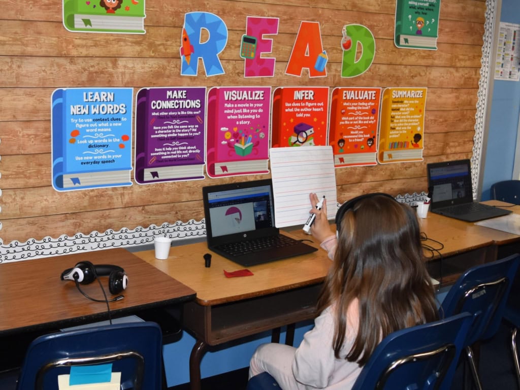 A Salem Elementary School student participating in the Ignite reading program works with an online tutor on a recent school day. (Photo courtesy of Spotsylvania County Public Schools)