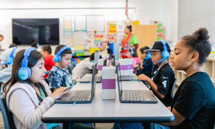 Students At Their Laptops