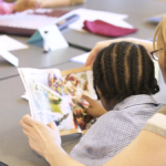Teacher Assessing Student Reading