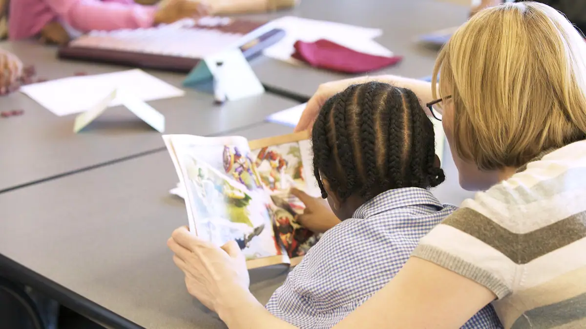 Teacher Assessing Student Reading
